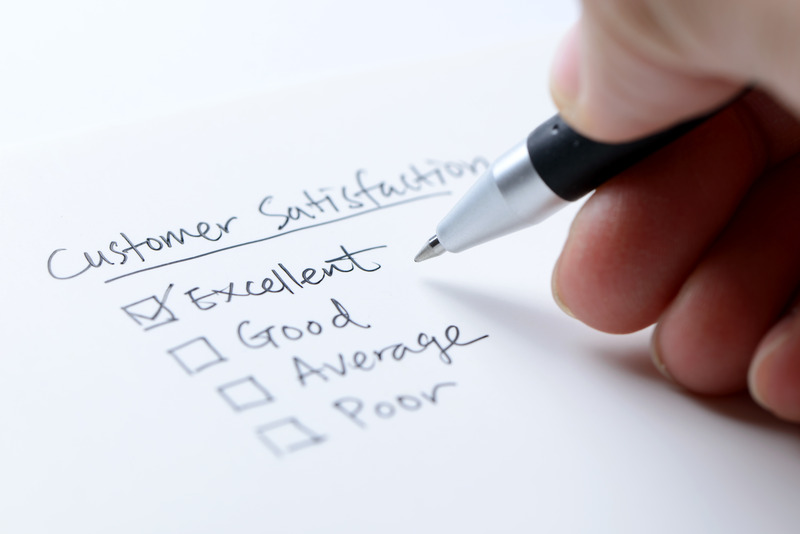 Image of paper with customer satisfaction written on it